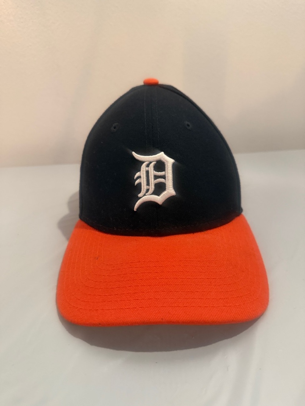 New Era Black Baseball Cap with Orange Accent